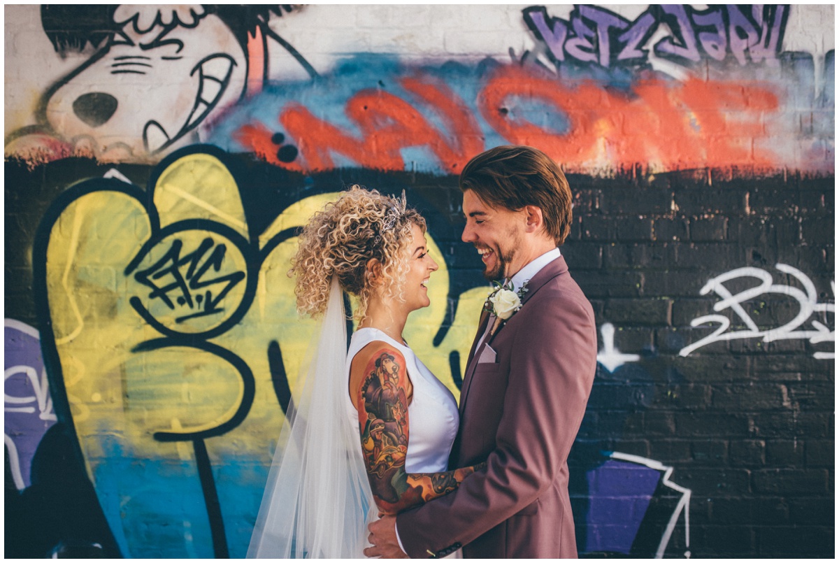 Amazing tattooed bride on her wedding day in Chester.