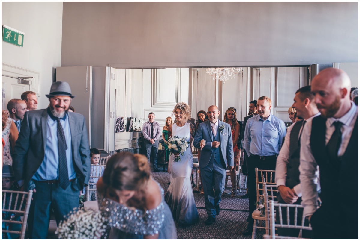 The bride gets walked down the aisle at Oddfellows in Chester by her Dad.