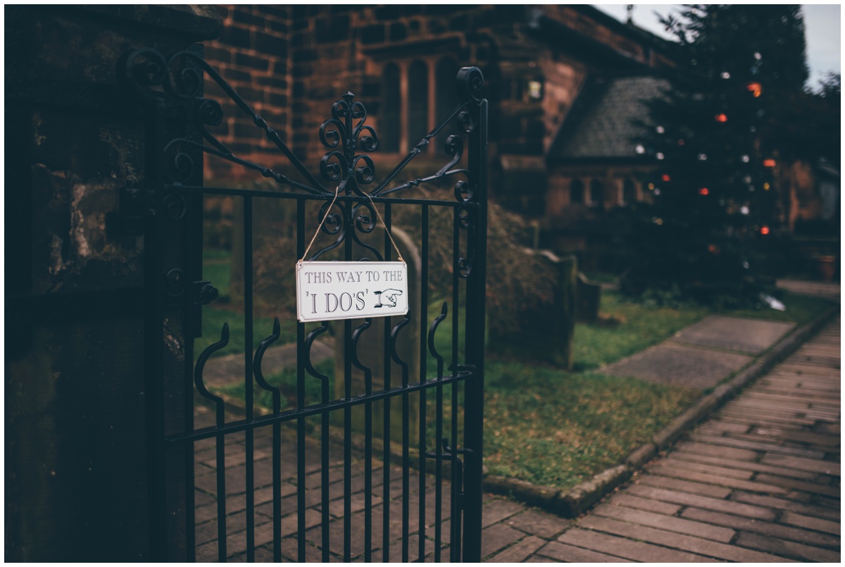 Sign to the entrance of the church in Cheshire.