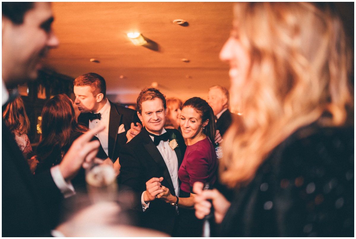 Wedding guests celebrate at New Years Eve wedding at Great John Street Hotel in Manchester.
