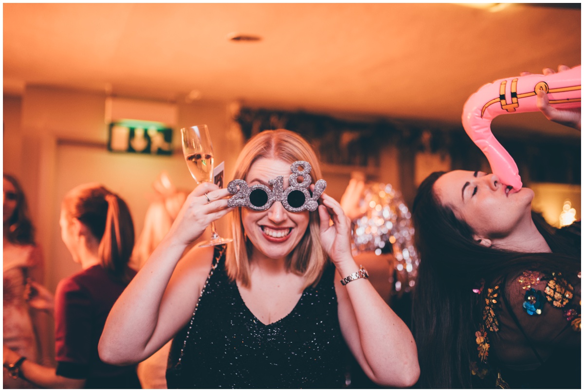 Wedding guests dance at New Years Eve wedding at Great John Street Hotel in Manchester.