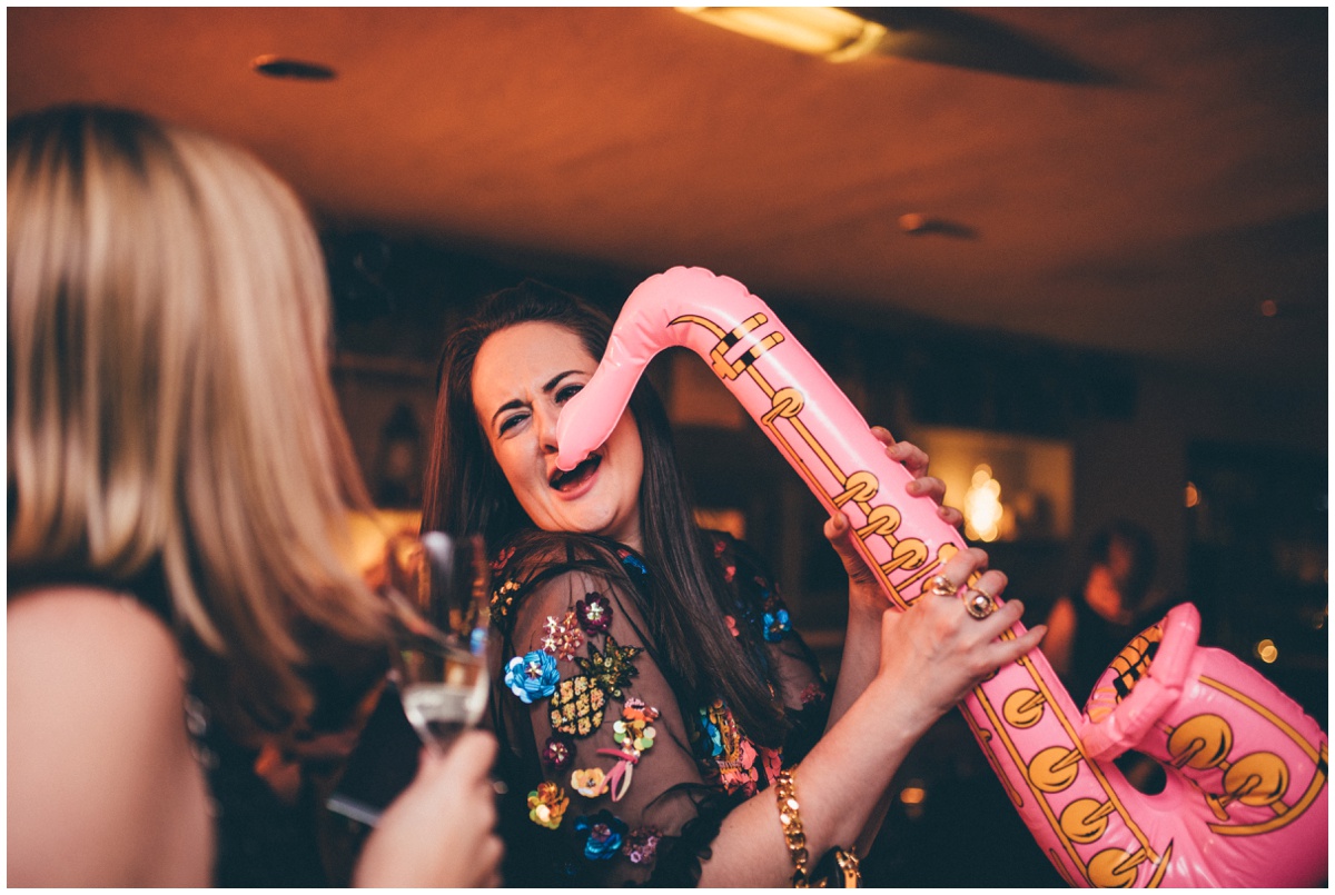 Wedding guests dance at New Years Eve wedding at Great John Street Hotel in Manchester.