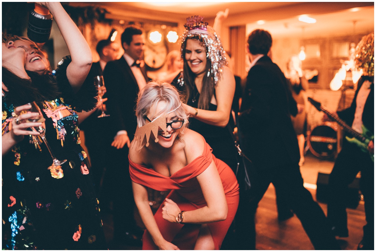 Wedding guests dance at New Years Eve wedding at Great John Street Hotel in Manchester.