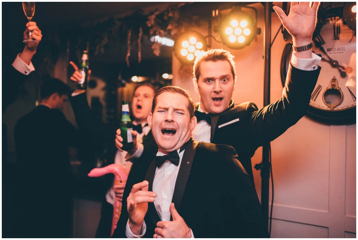 Wedding guests celebrate at New Years Eve wedding at Great John Street Hotel in Manchester.