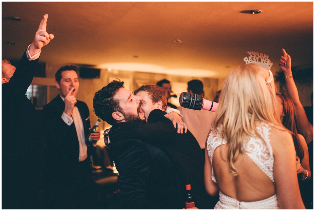 Wedding guests dance at New Years Eve wedding at Great John Street Hotel in Manchester.