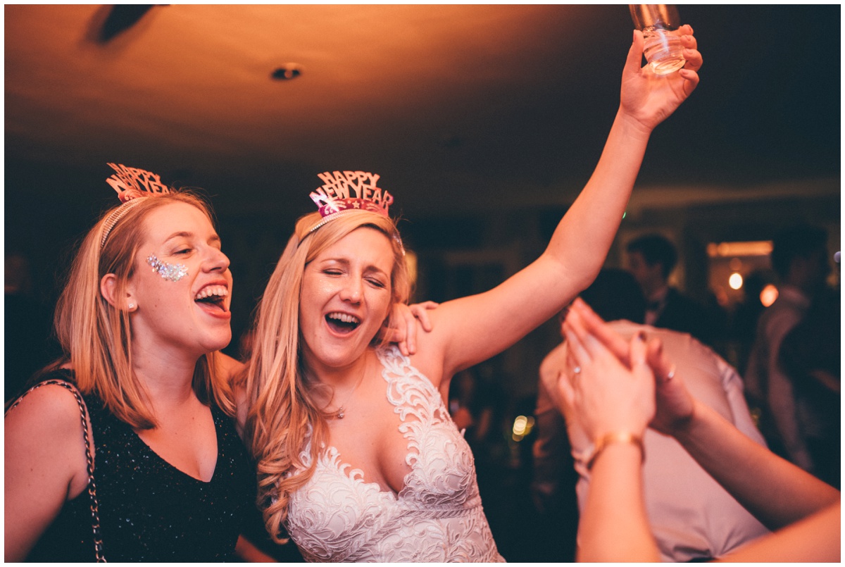 Wedding guests dance at New Years Eve wedding at Great John Street Hotel in Manchester.