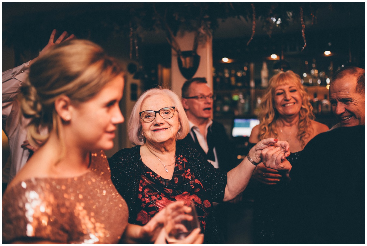Wedding guests dance at New Years Eve wedding at Great John Street Hotel in Manchester.