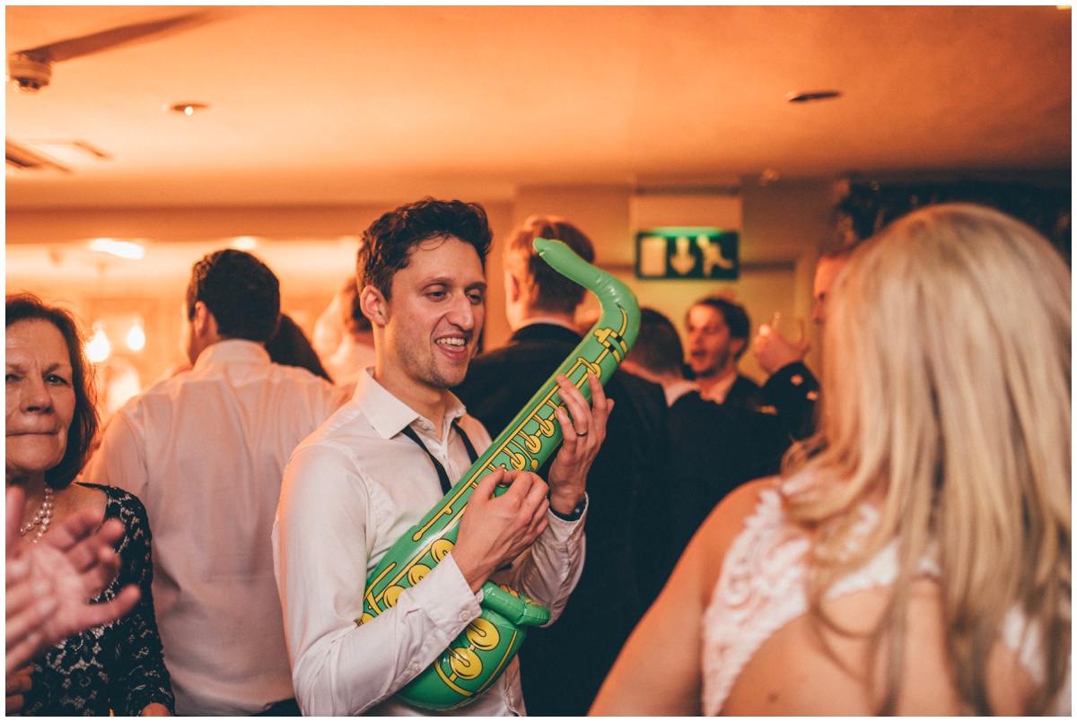 Wedding guests dance at New Years Eve wedding at Great John Street Hotel in Manchester.