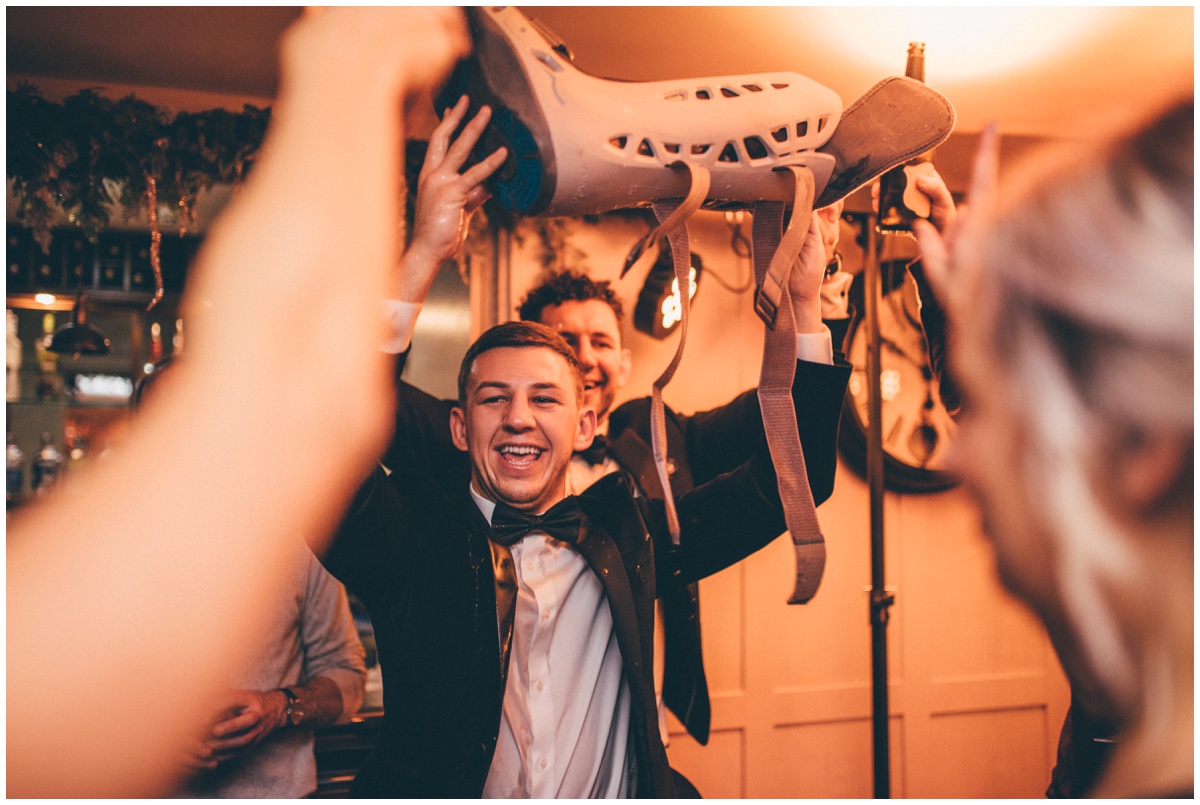 Wedding guests dance at New Years Eve wedding at Great John Street Hotel in Manchester.