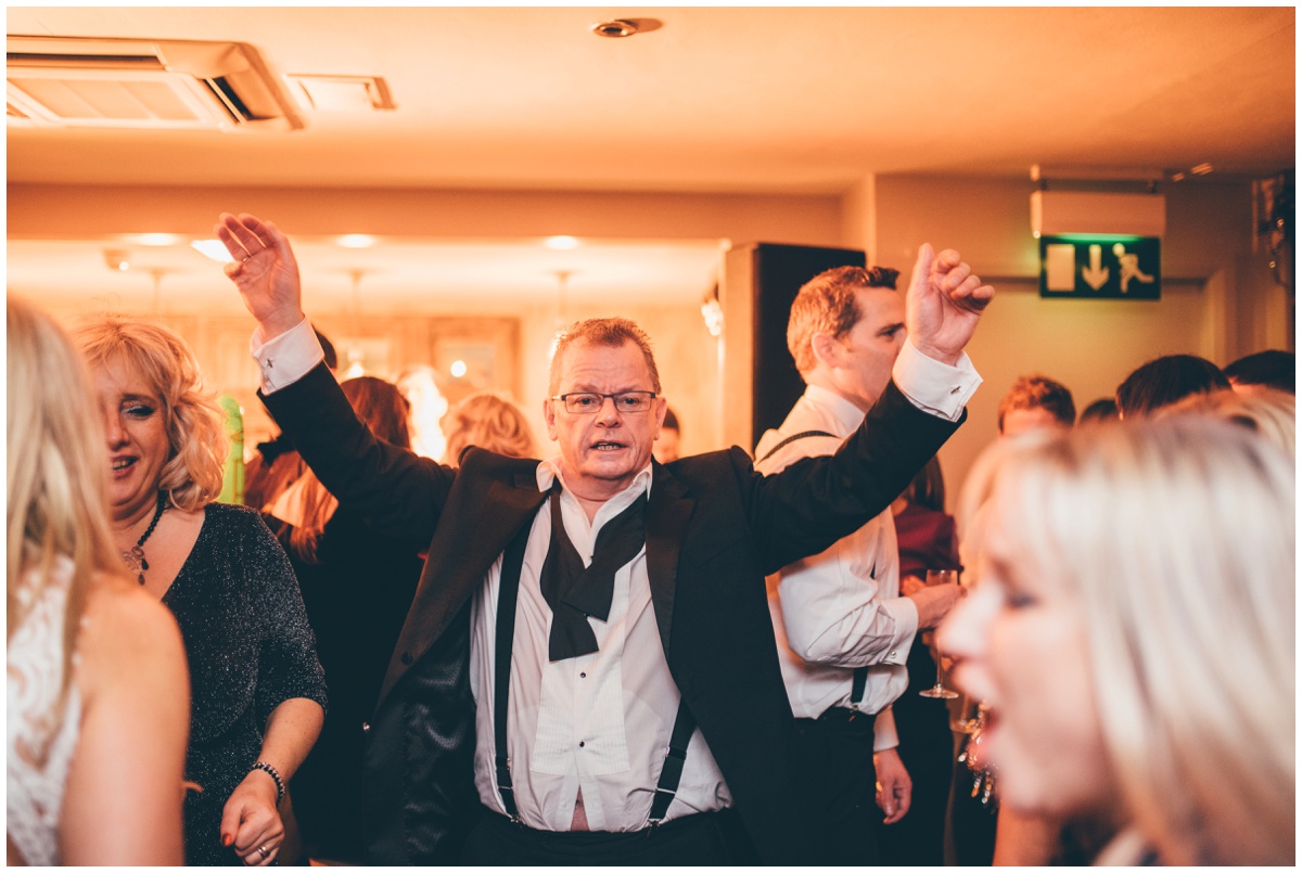 Wedding guests dance at New Years Eve wedding at Great John Street Hotel in Manchester.