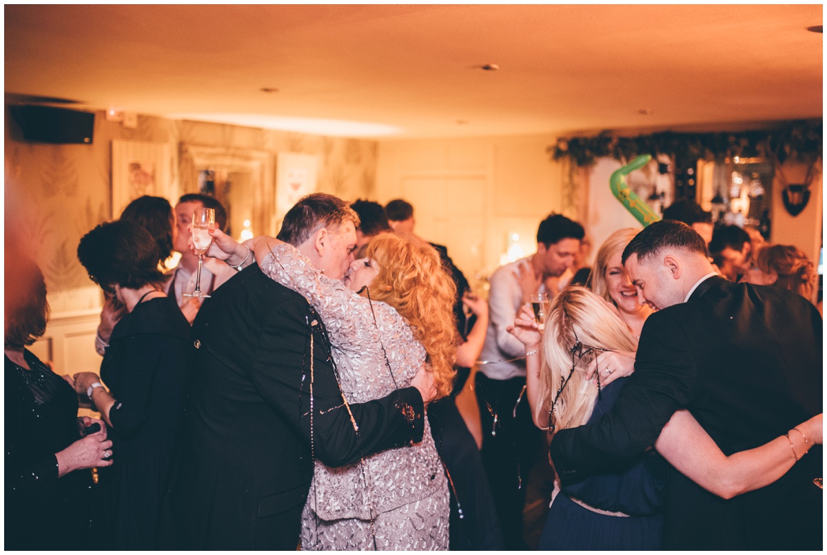 Wedding guests celebrate the New Year at New Years Eve wedding at Great John Street Hotel in Manchester.