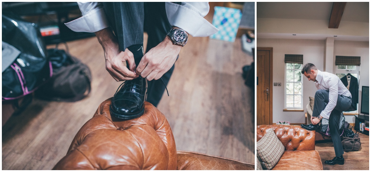 Groomsman gets ready for the Merrydale Manor wedding.