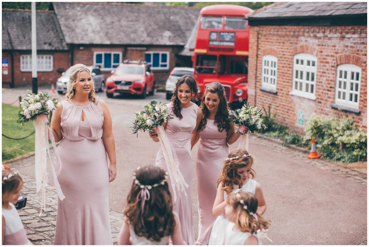 Bridesmaids waiting excitedly at St Mary's church for the bride to arrive.
