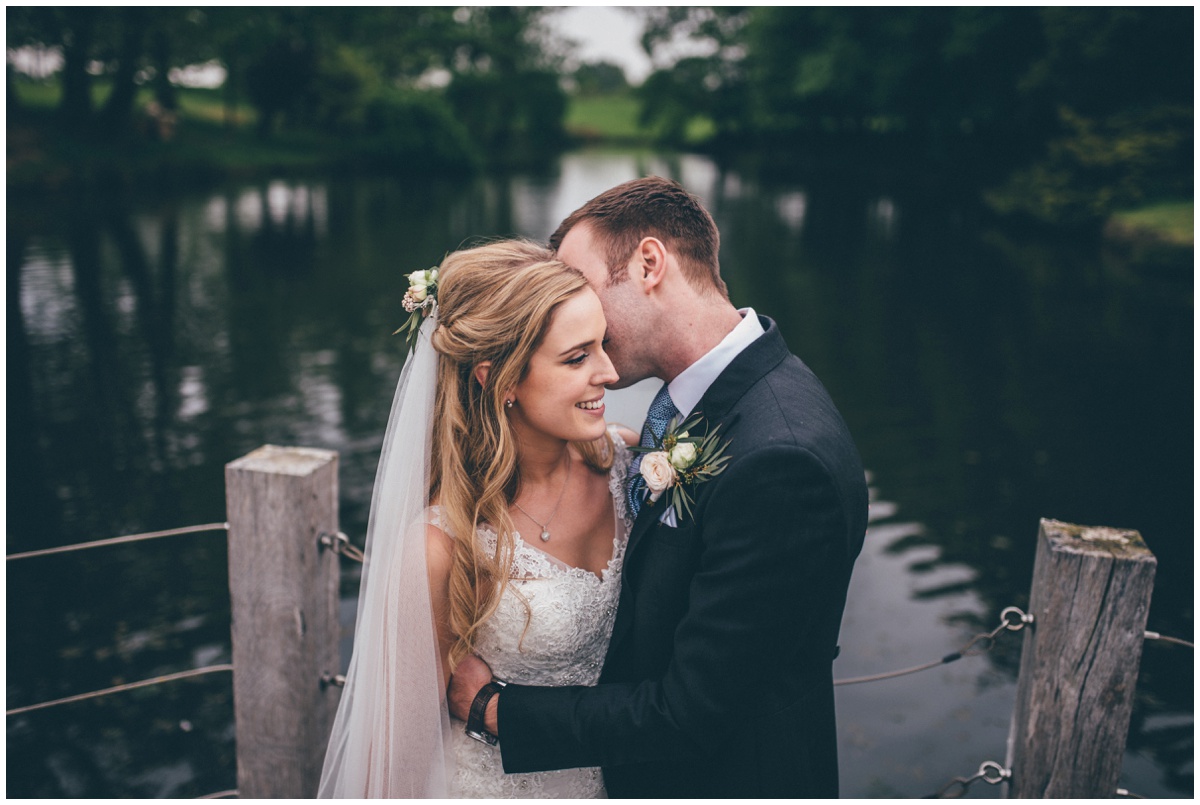Bride and groom at Merrydale Manor have their wedding photographs taken.