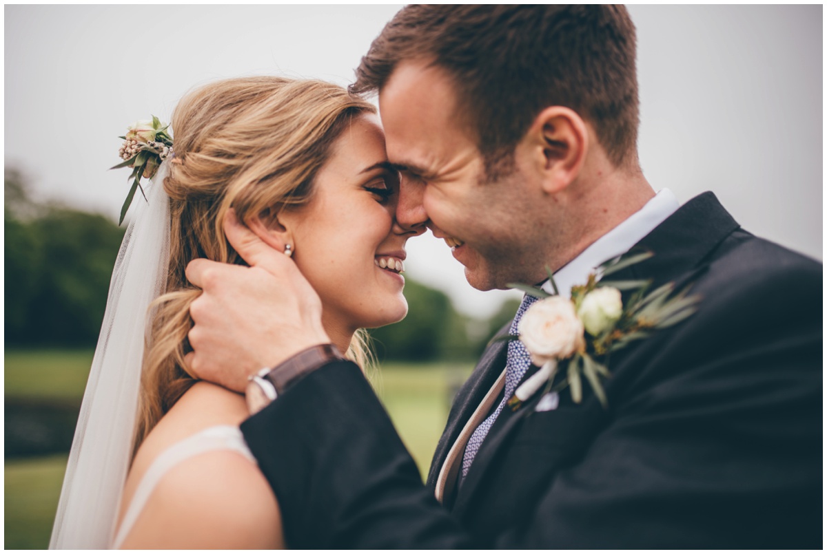 Bride and groom have their wedding photographs taken at Merrydale Manor.