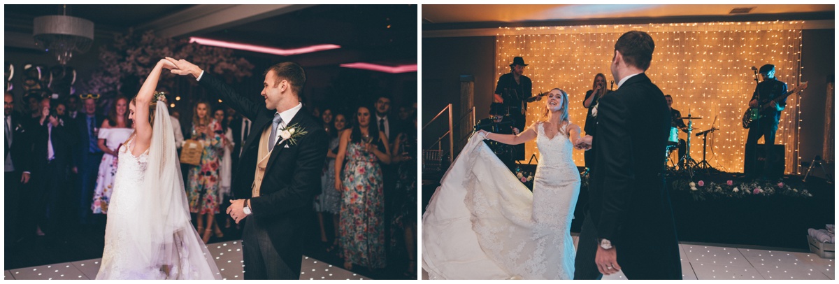 The bride and groom do their First Dance on the lit-up dancefloor at Merrydale Manor.