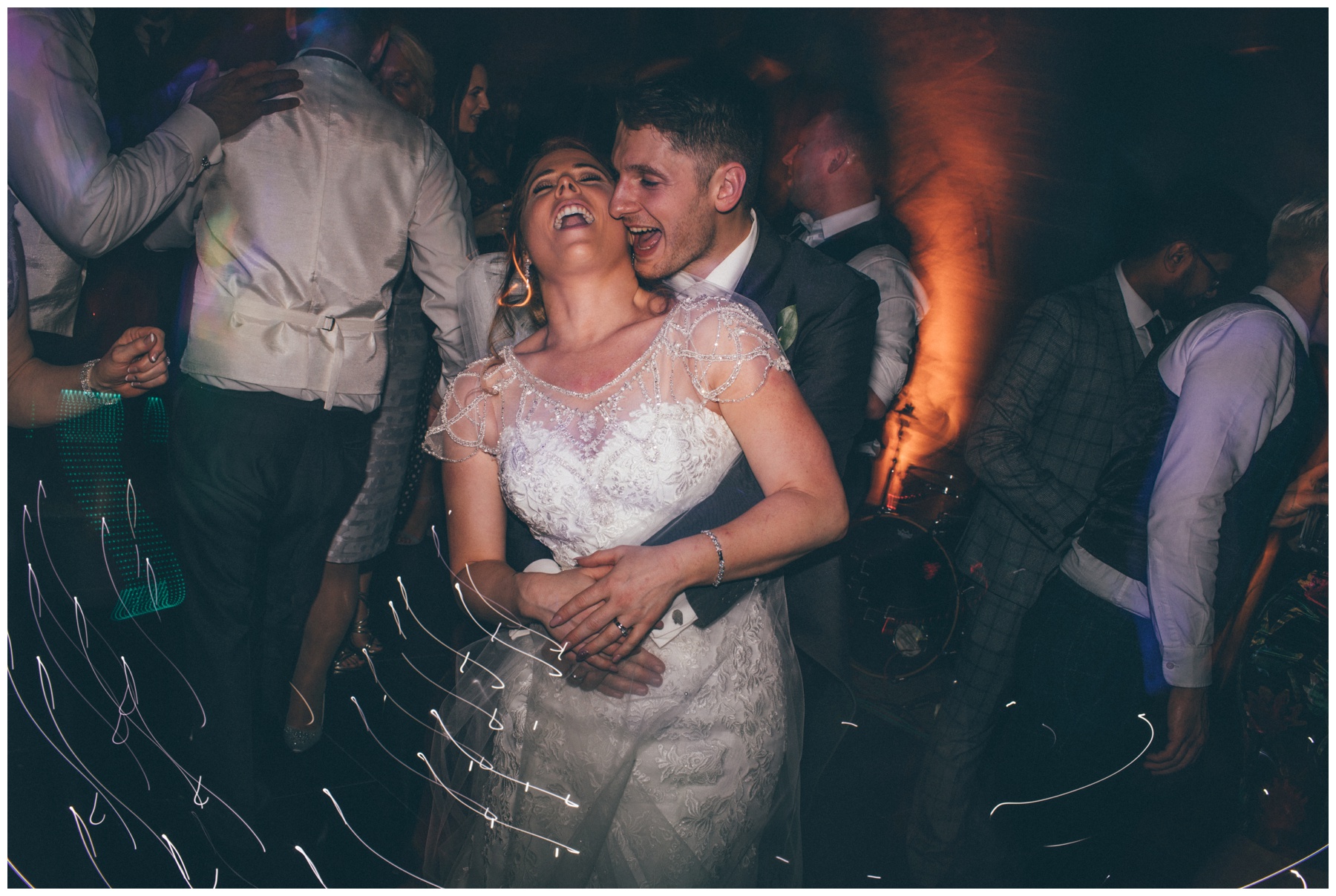 The newlyweds rock the dance floor at Peckforton Castle in Cheshire.