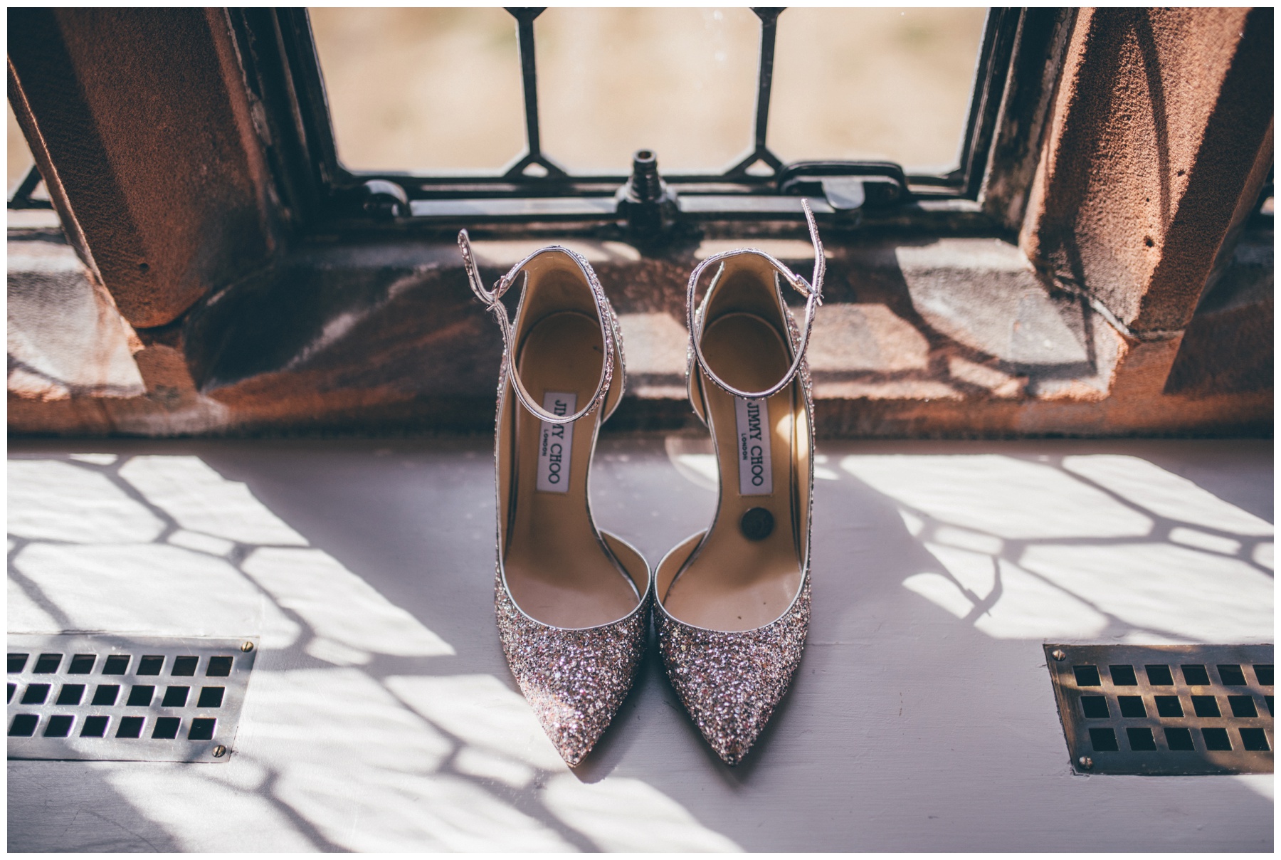 Stunning sparkly Jimmy Choo wedding shoes on the window sill at Thornton Manor.
