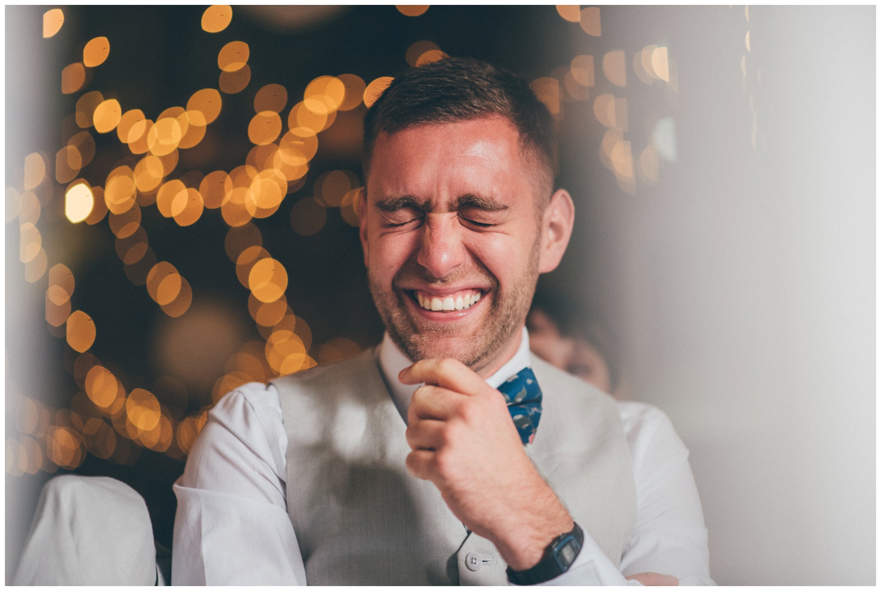 Hysterical wedding guest at Askham Hall, enjoying the wedding speeches.