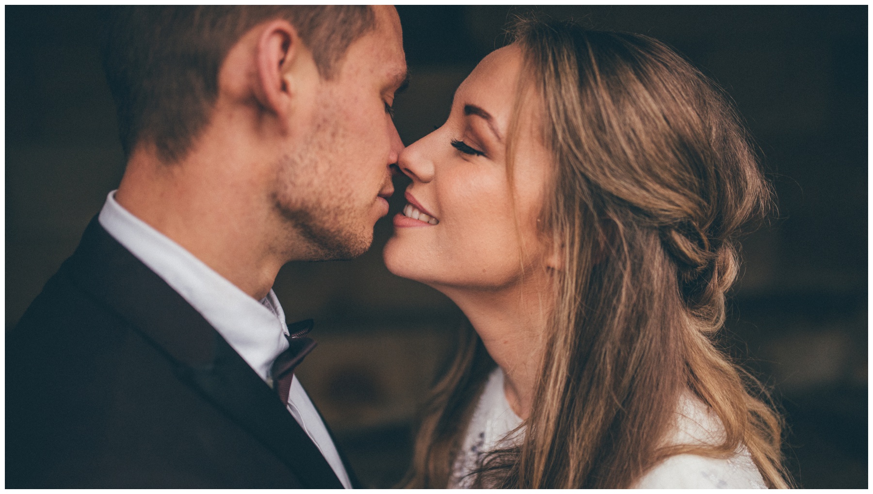 Beautiful blonde bride at her Manchester wedding in as ASOS wedding gown.