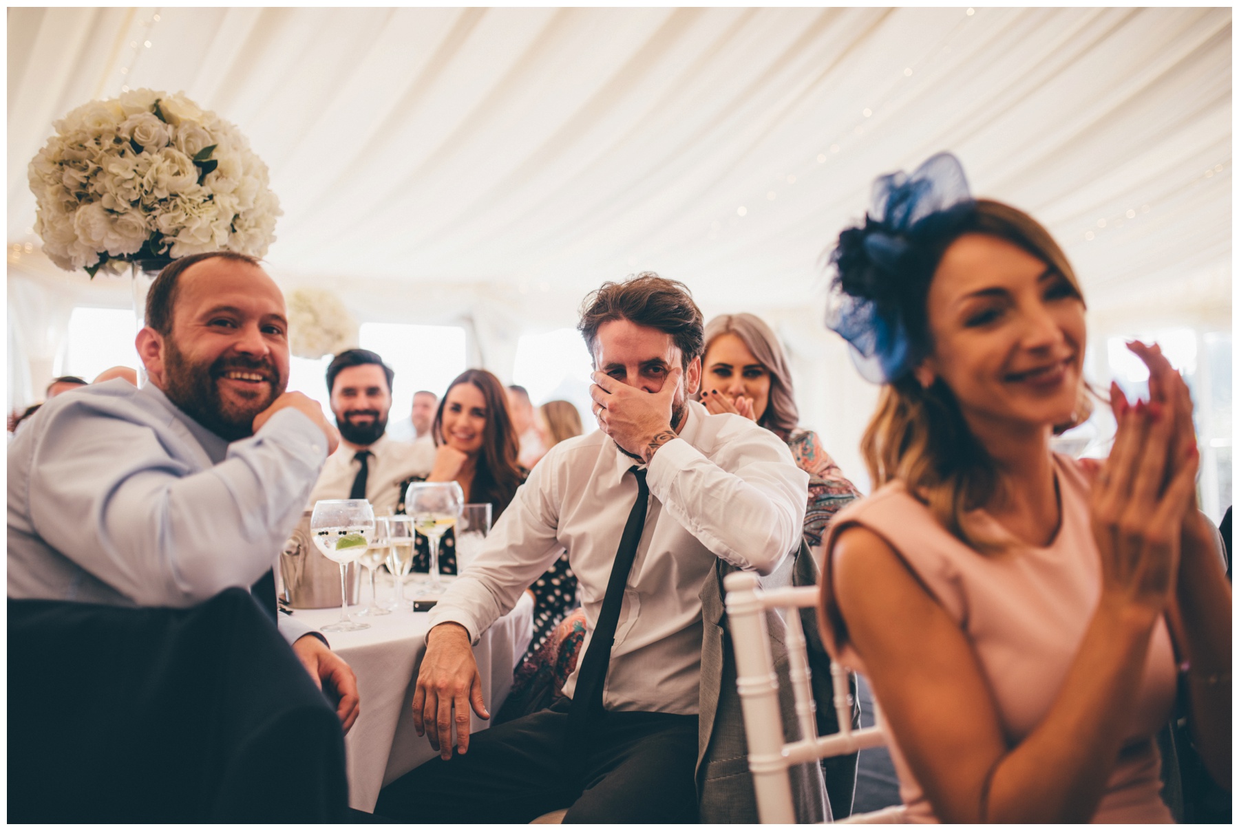 Guest at Liverpool wedding cringes during the wedding speeches.