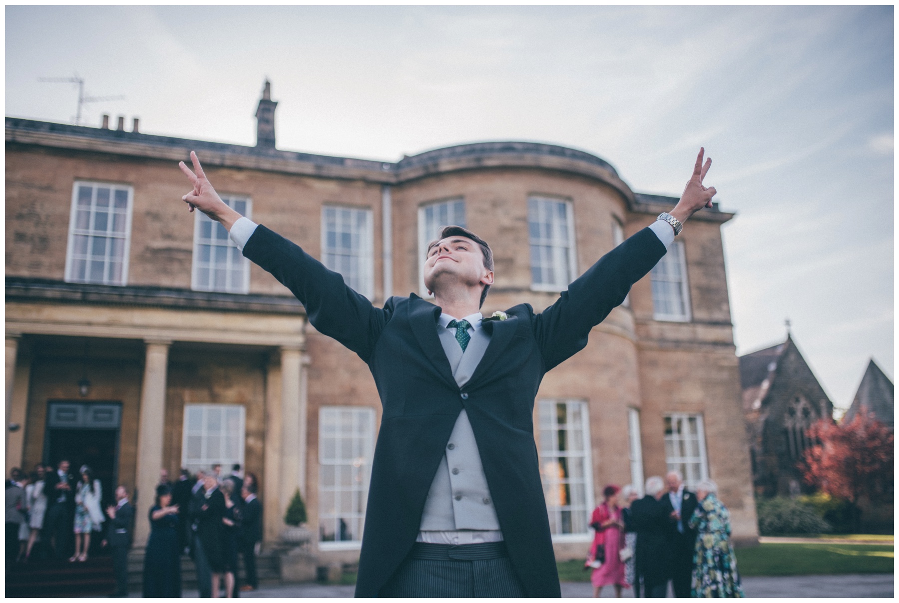 Groomsman celebrates the wedding at Rudding Park hotel.