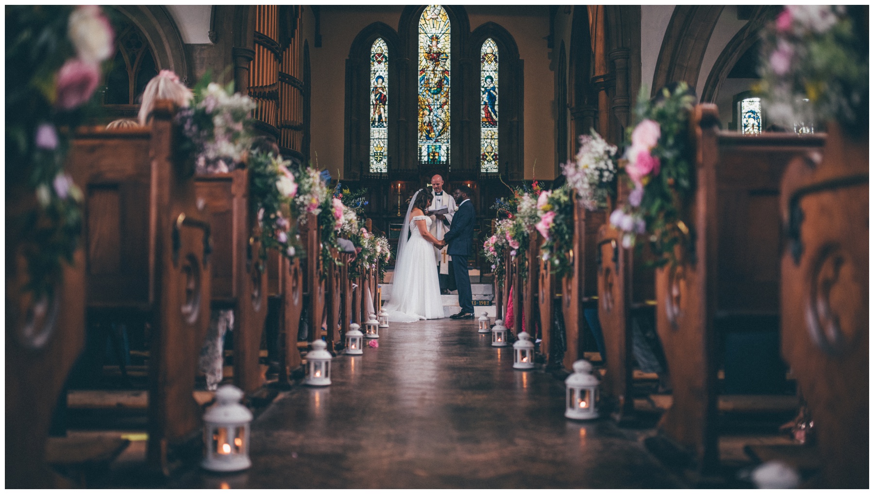 Beautifully flower filled church for a wedding in Essex.