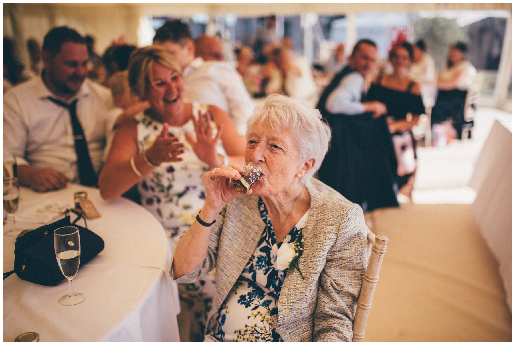 Funny gran shots Jaegermeister at wedstival in Cheshire.