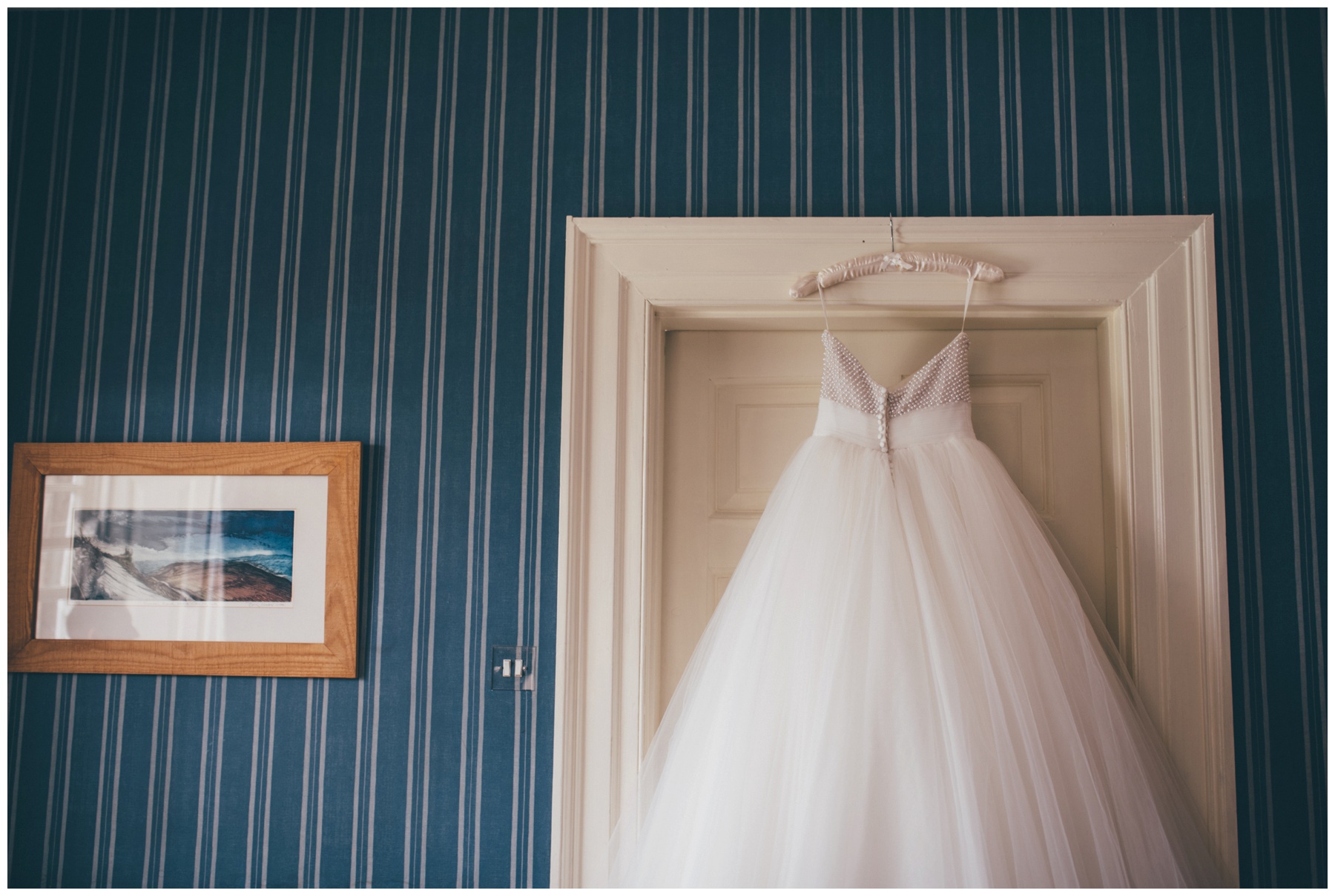 Stunning Ronald Joyce beaded gown, hung up in the bridal suite at Swinton Park Estate in Yorkshire.