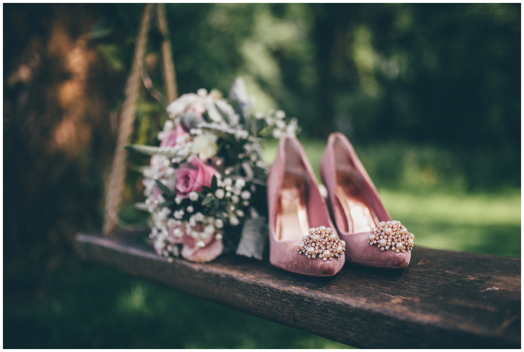 Stunning suede pink Ted Baker wedding shoes at Trafford Hall in Cheshire.