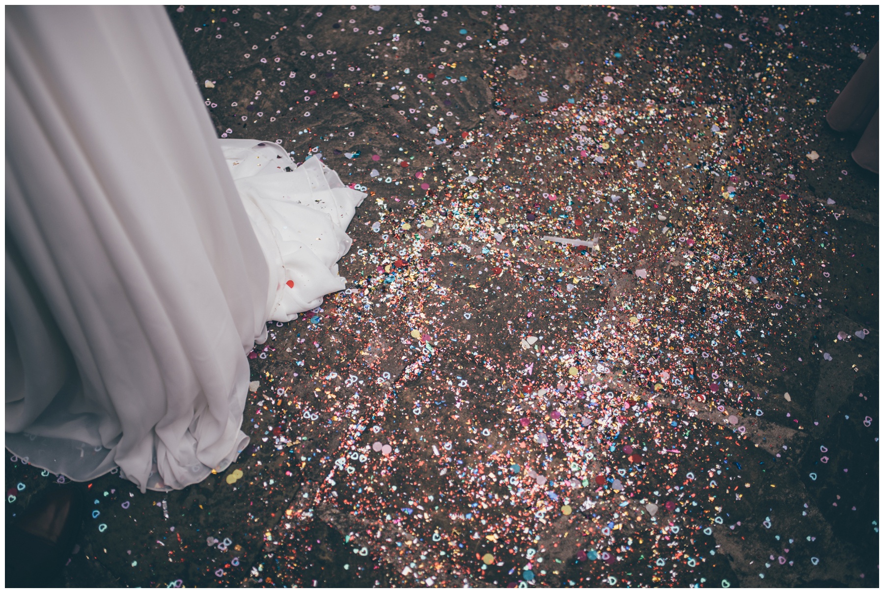 The bride has metallic confetti and glitter for her wedding which went everywhere at Trafford Hall!
