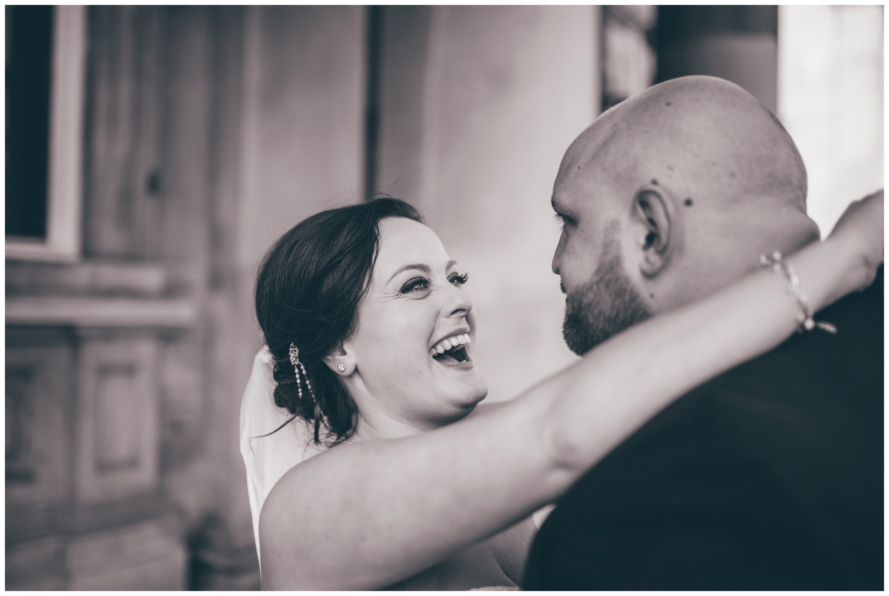 The new husband and wife share a joke after their St George's Hall wedding in Liverpool.