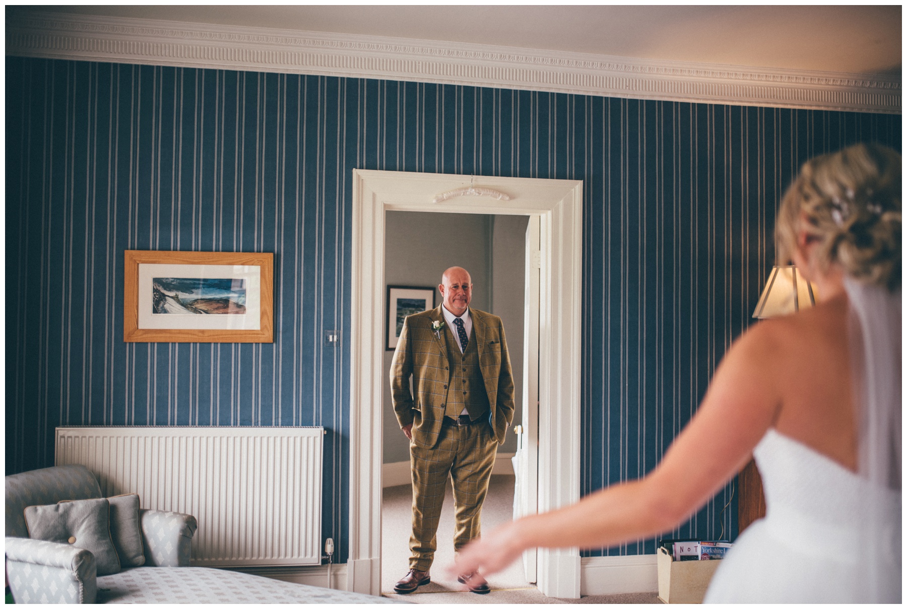 Father of the Bride sees his daughter in her wedding gown at the Swinton Estate in Yorkshire.