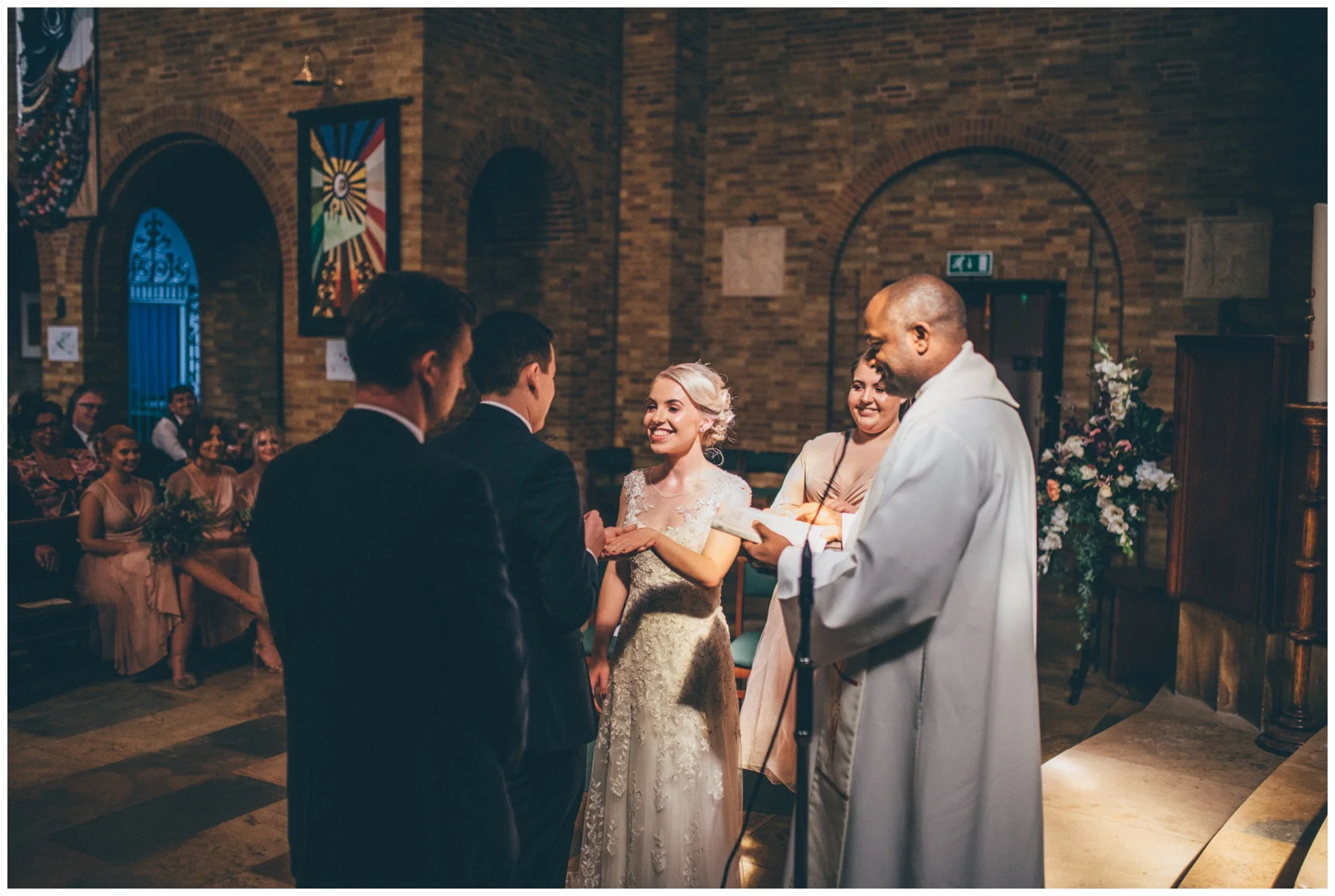 Bride and groom do their vows at Sacred Heart Church in Sheffield.