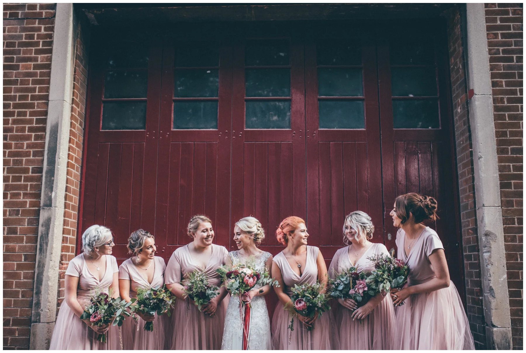 Bride and her bridesmaids pose for their wedding photographs in Sheffield city centre.