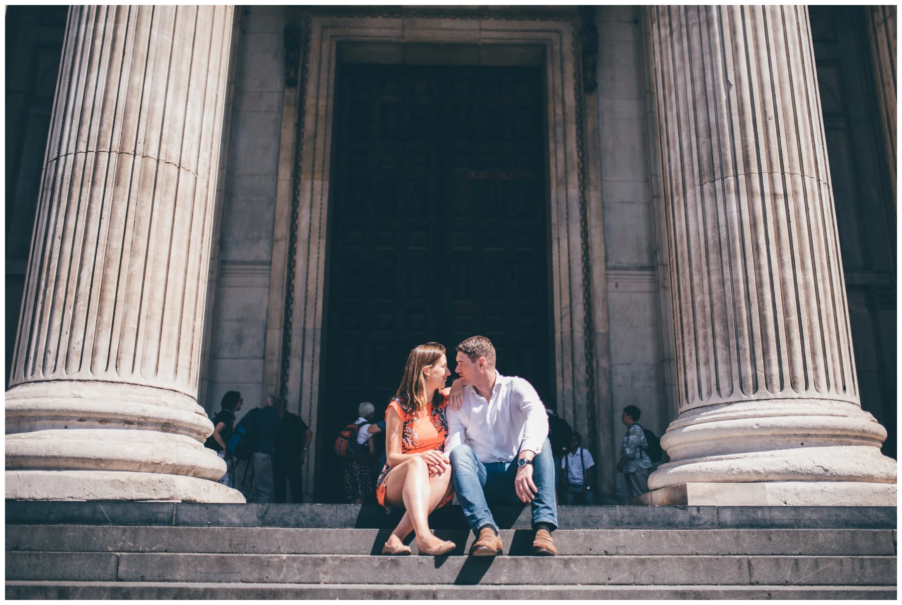 Young couple have a photoshoot just before their wedding in London City centre.