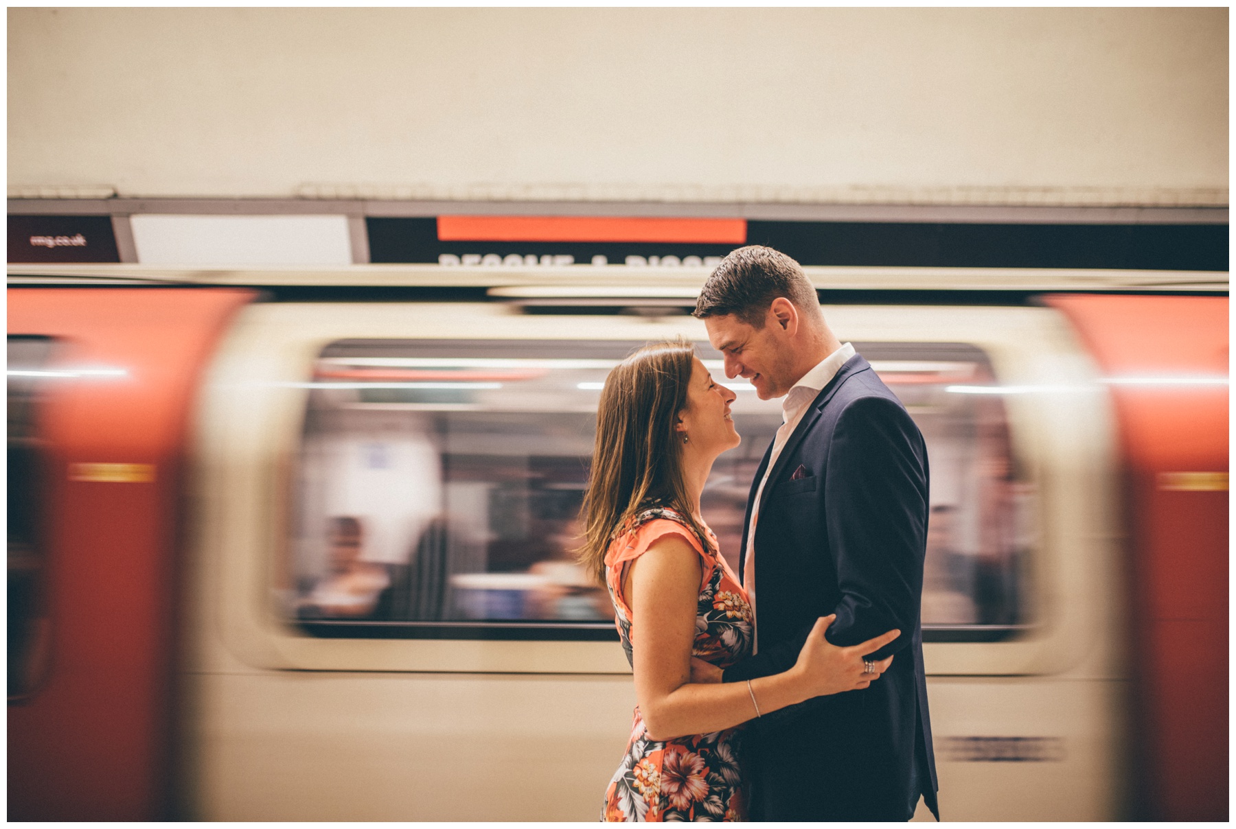 Bride and groom to-be have a photo shoot ahead of their wedding in London Underground.