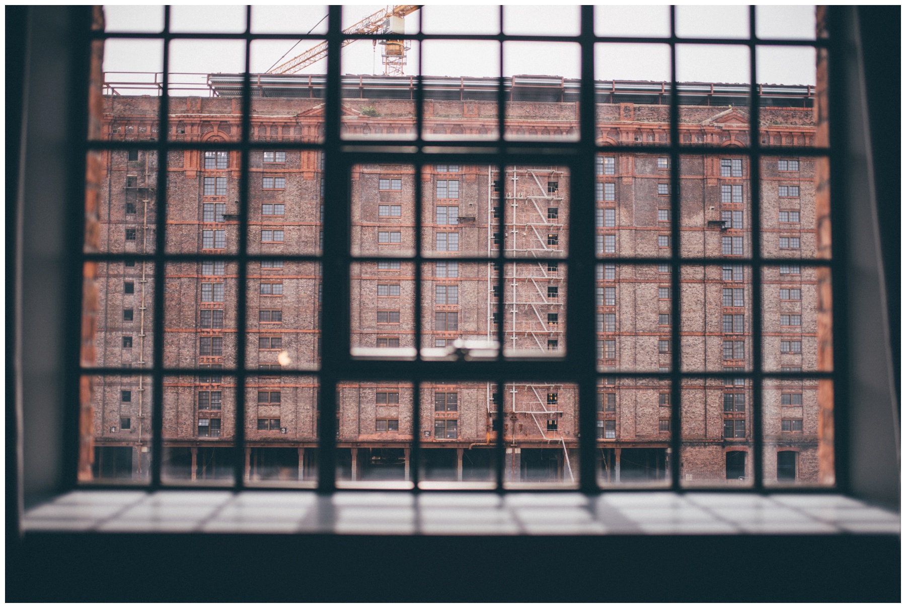 Albert Docks through a window at the Titanic Hotel in Liverpool.