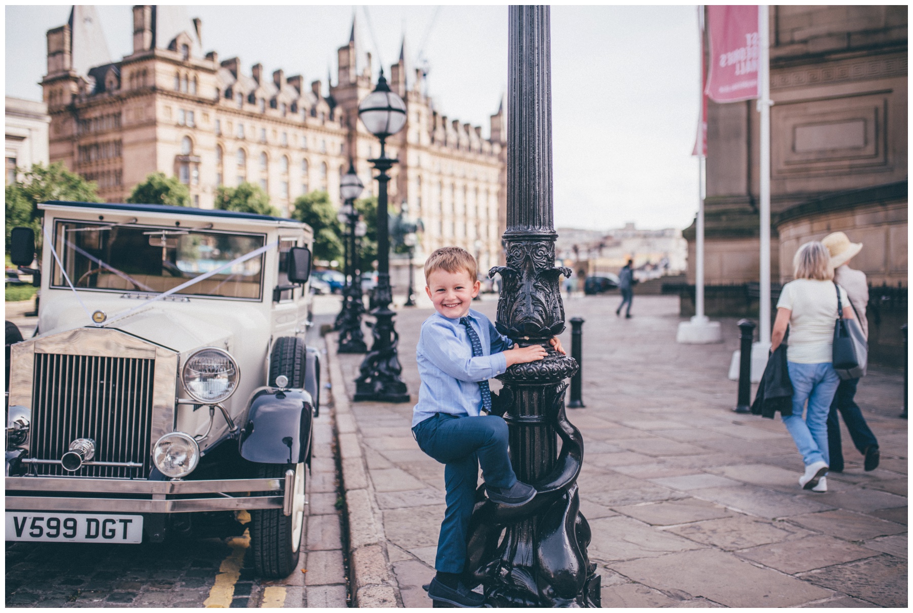 Cute little boy outside St Georges Hall wedding.