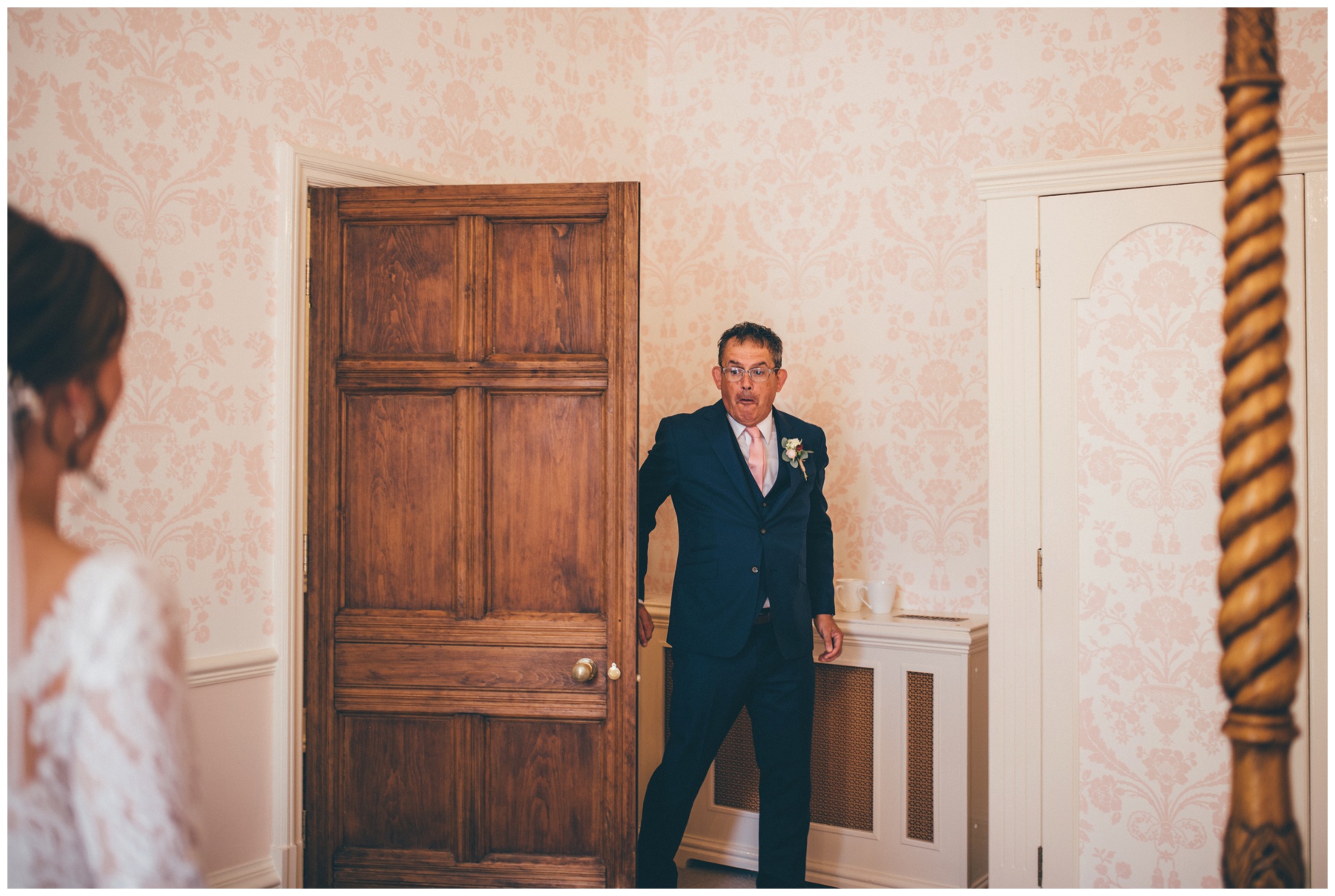 The beautiful bride's Dad sees her for the first time.