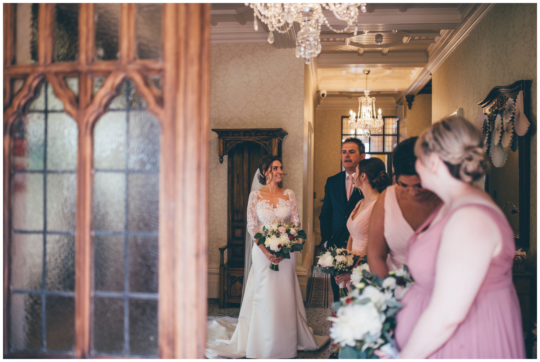 The bridal party waiting to walk down the aisle at Tilstone House.