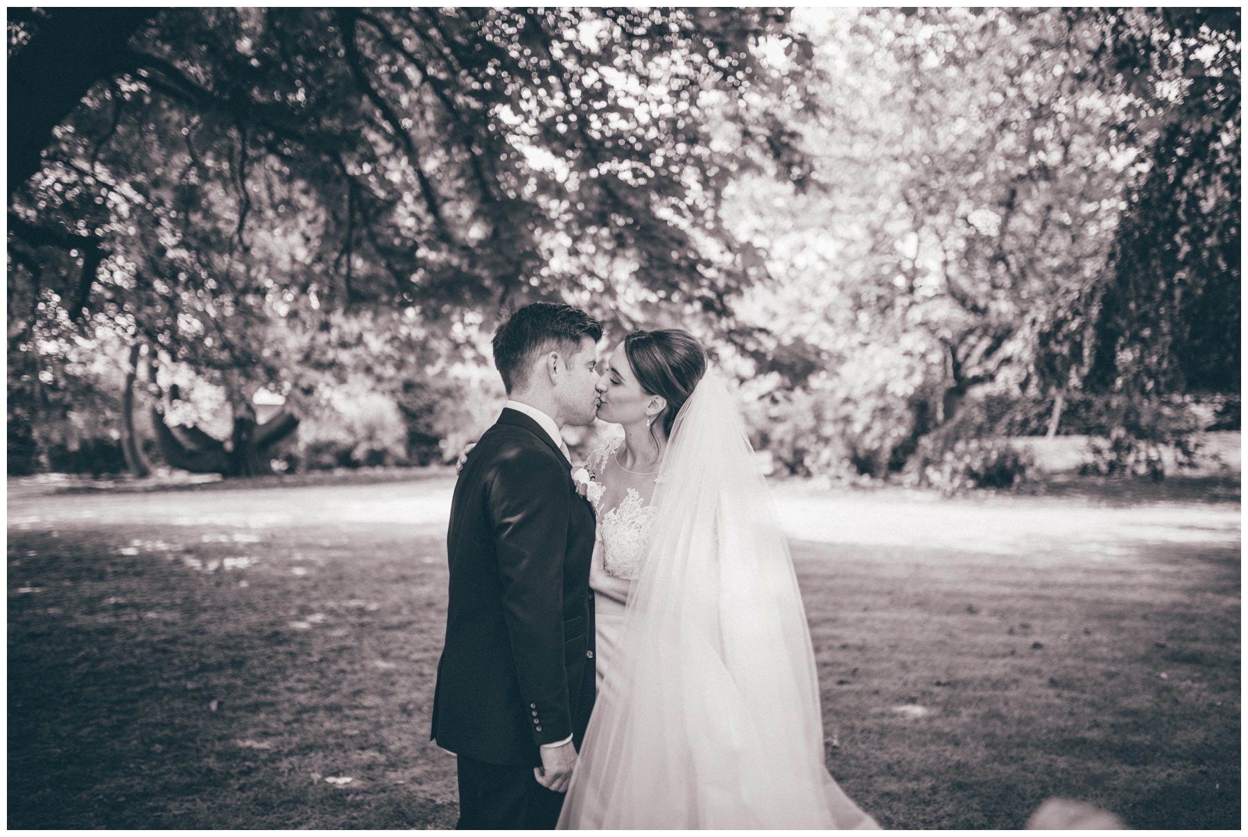 Bride and Groom in the beautiful gardens at Tilstone House in Cheshire.