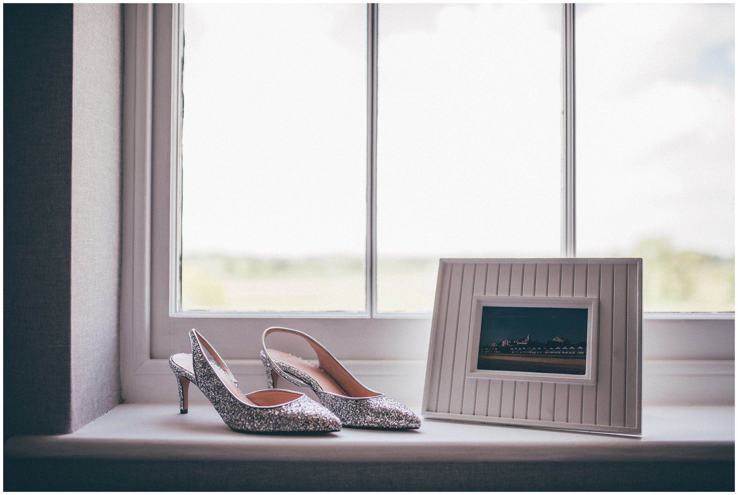 Bride's stunning sparkly shoes on the morning of her wedding at her parents house.
