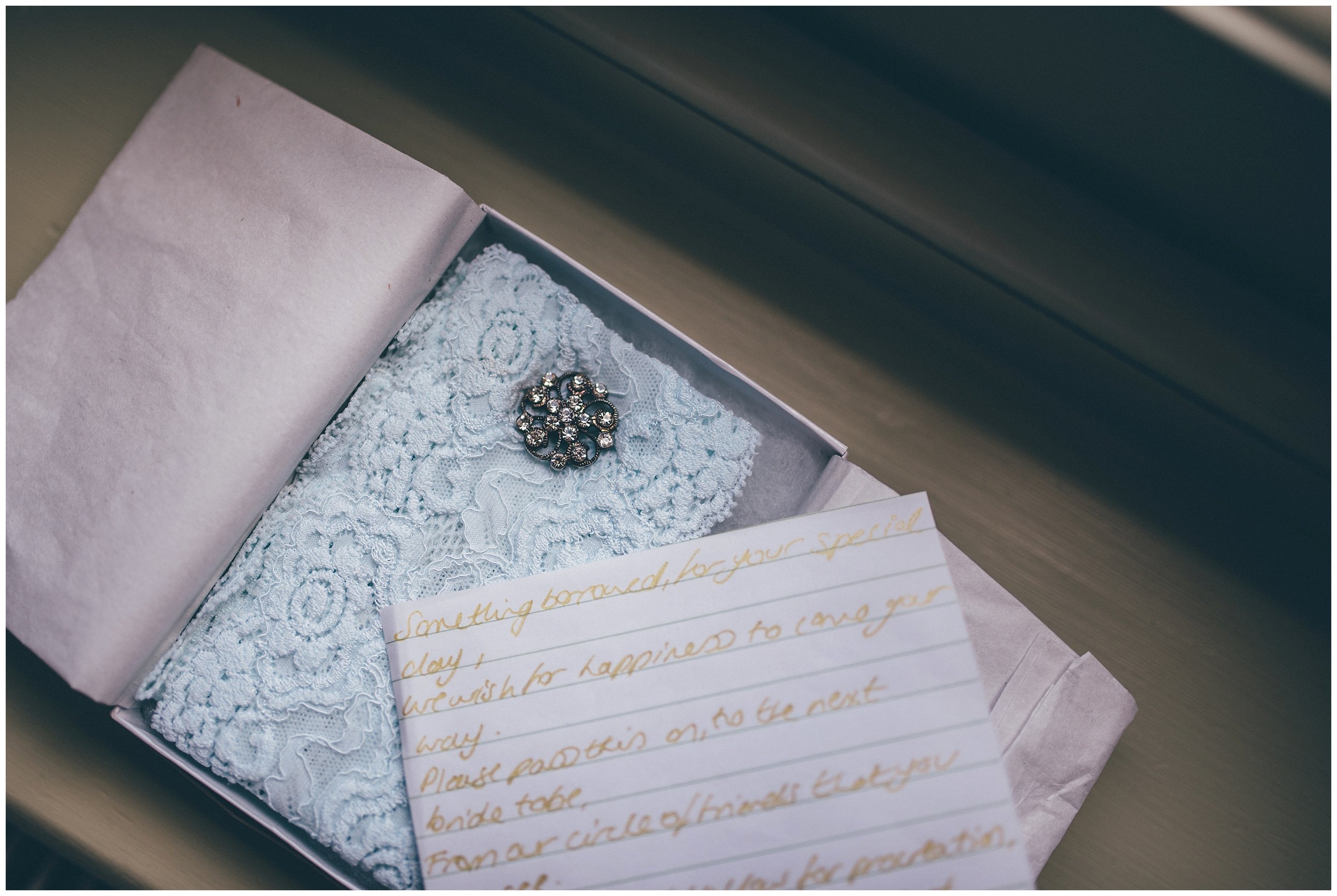 Beautiful lace blue garter from the bridesmaids to the bride.