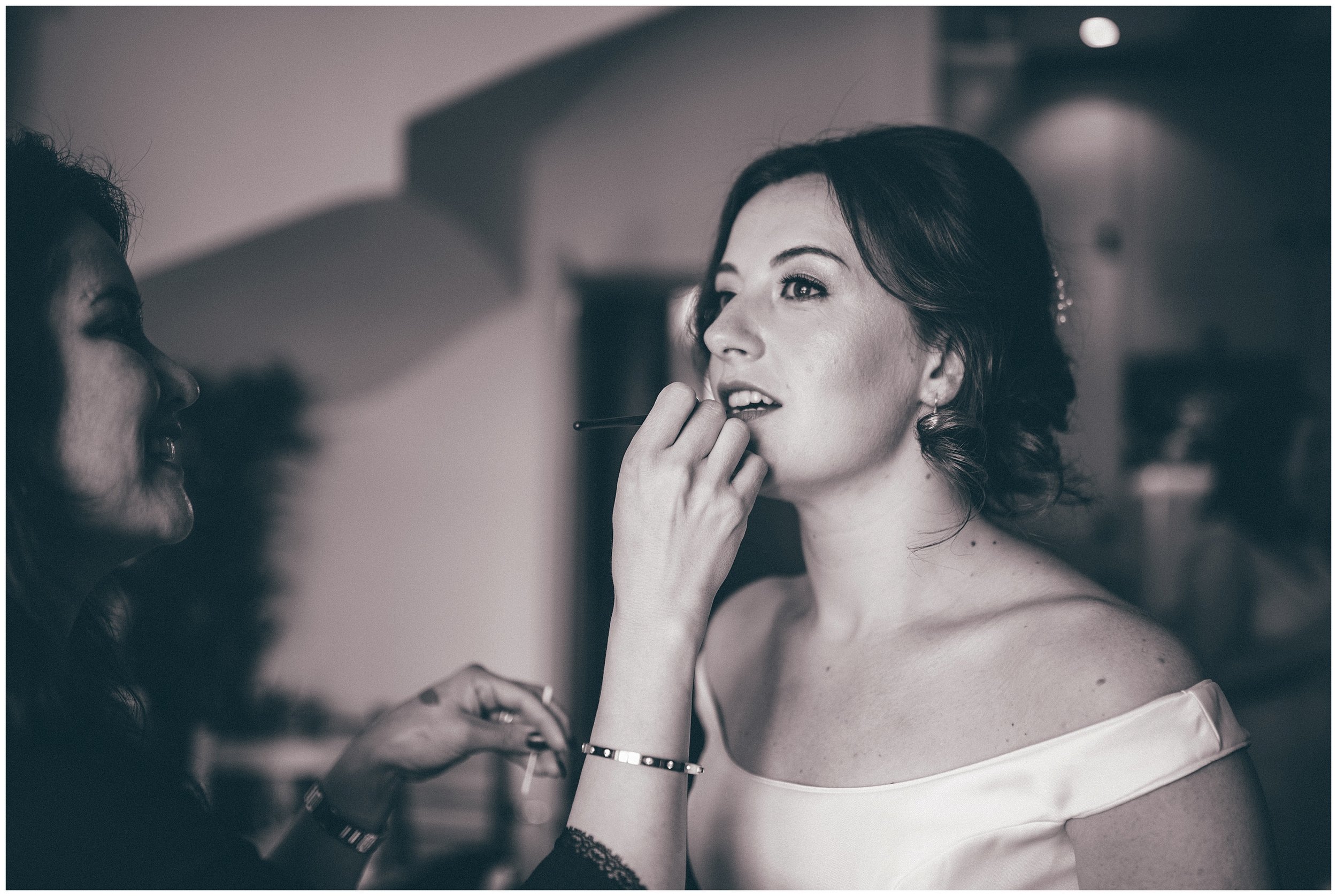 Bride gets finishing touches doe to her makeup by local MUA, Adie Brooks.