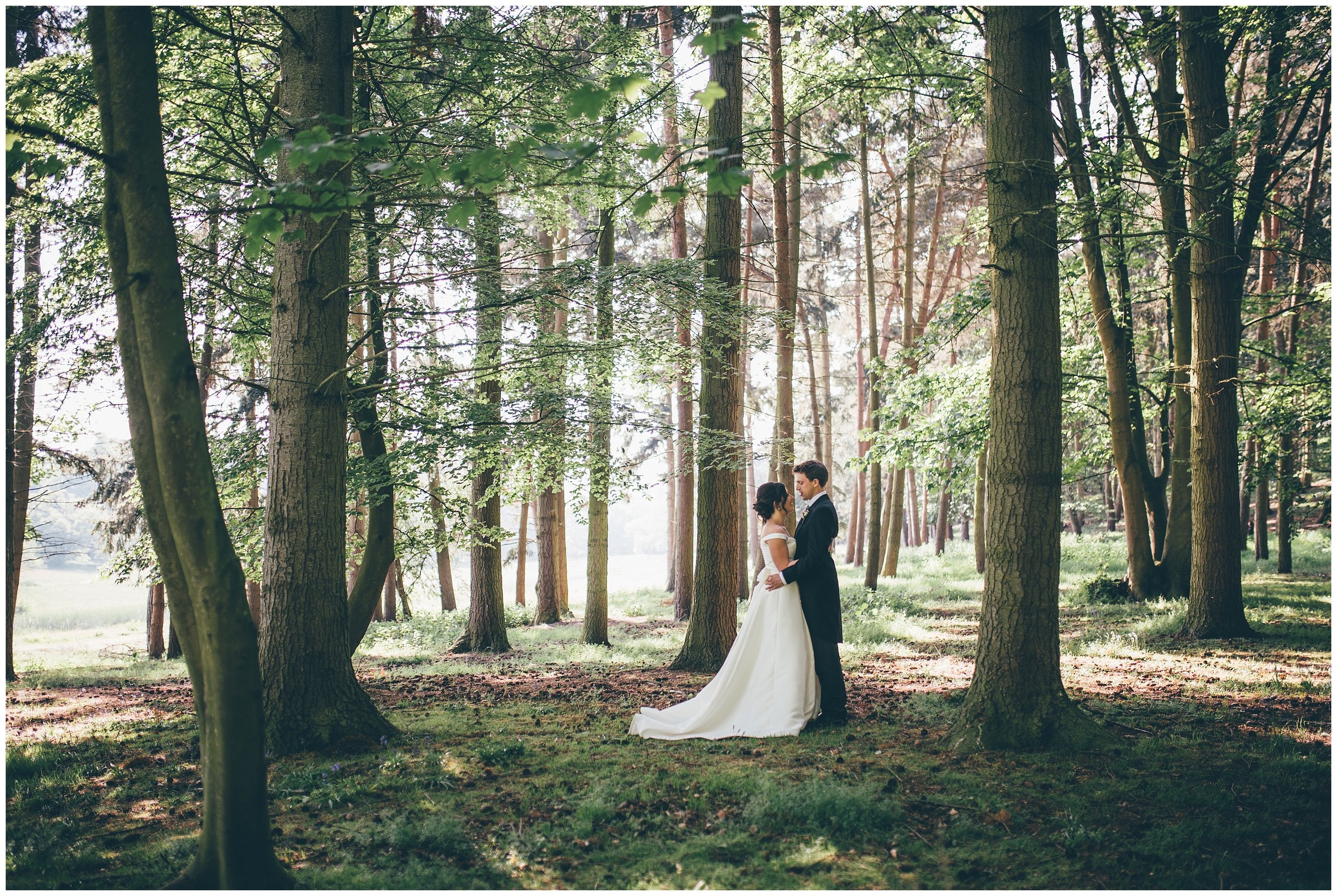 Bride and groom photographed at Henham Park wedding barns by Cheshire wedding photographer.