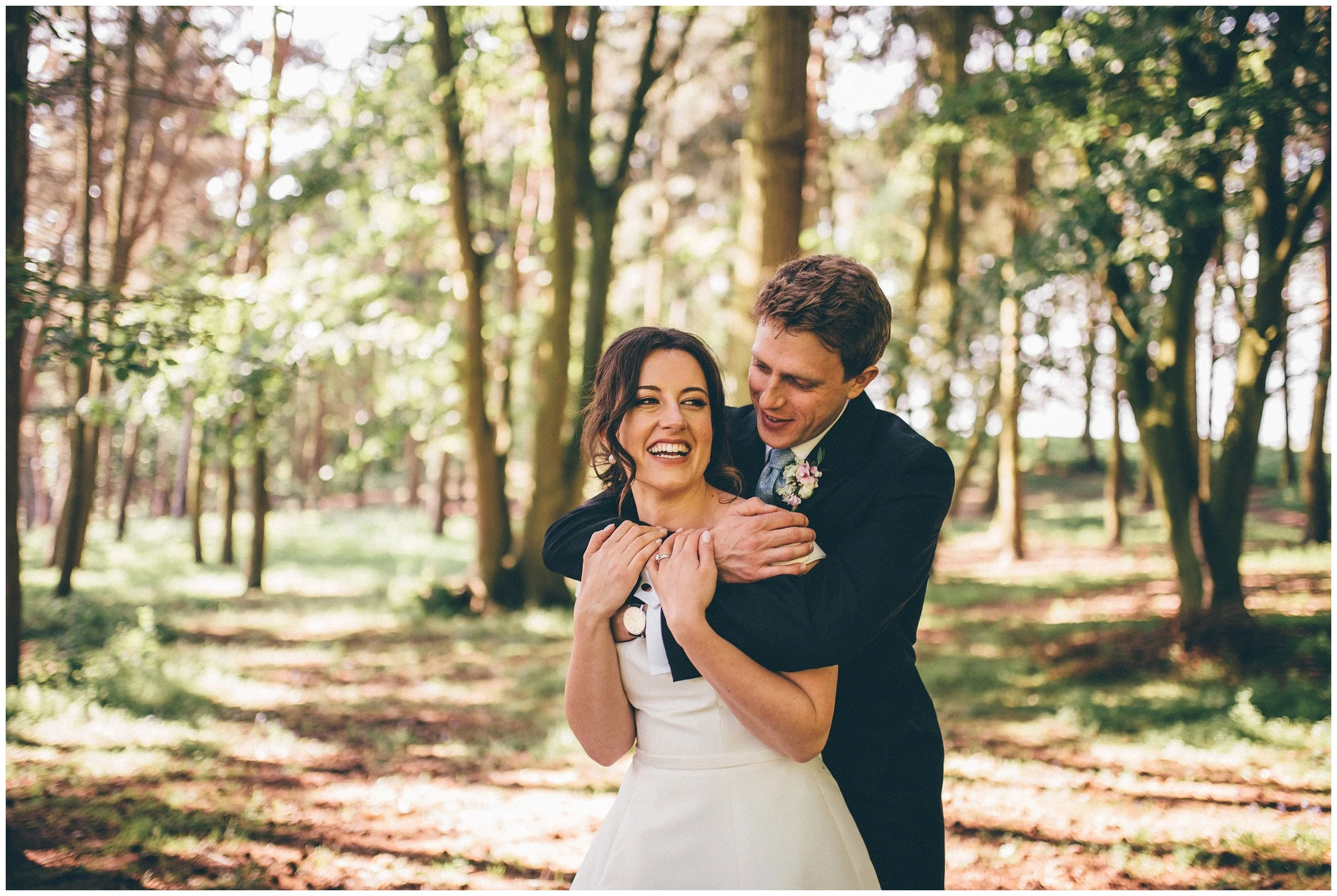 Bride and groom photographed at Henham Park wedding barns by Cheshire wedding photographer.