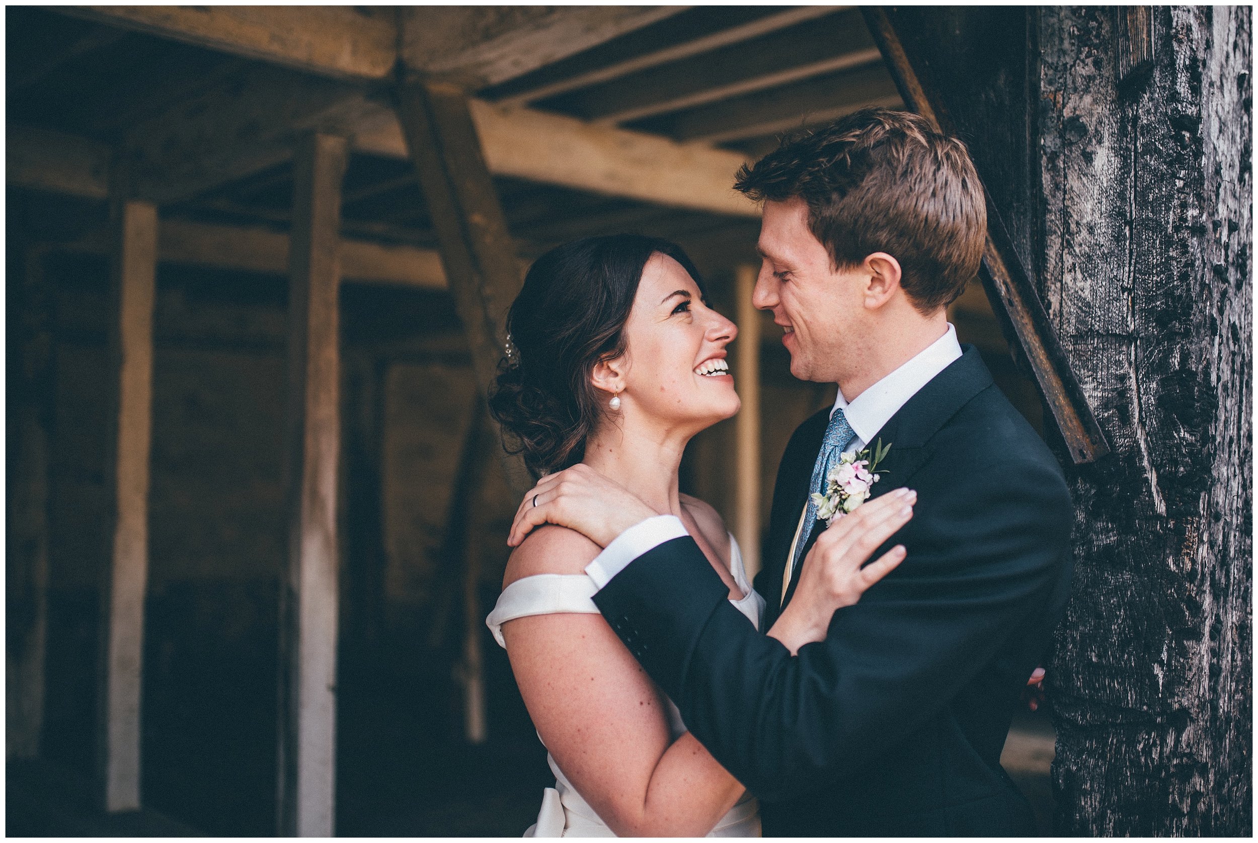 Bride and groom have their wedding photographs taken at Henham Park wedding barns.