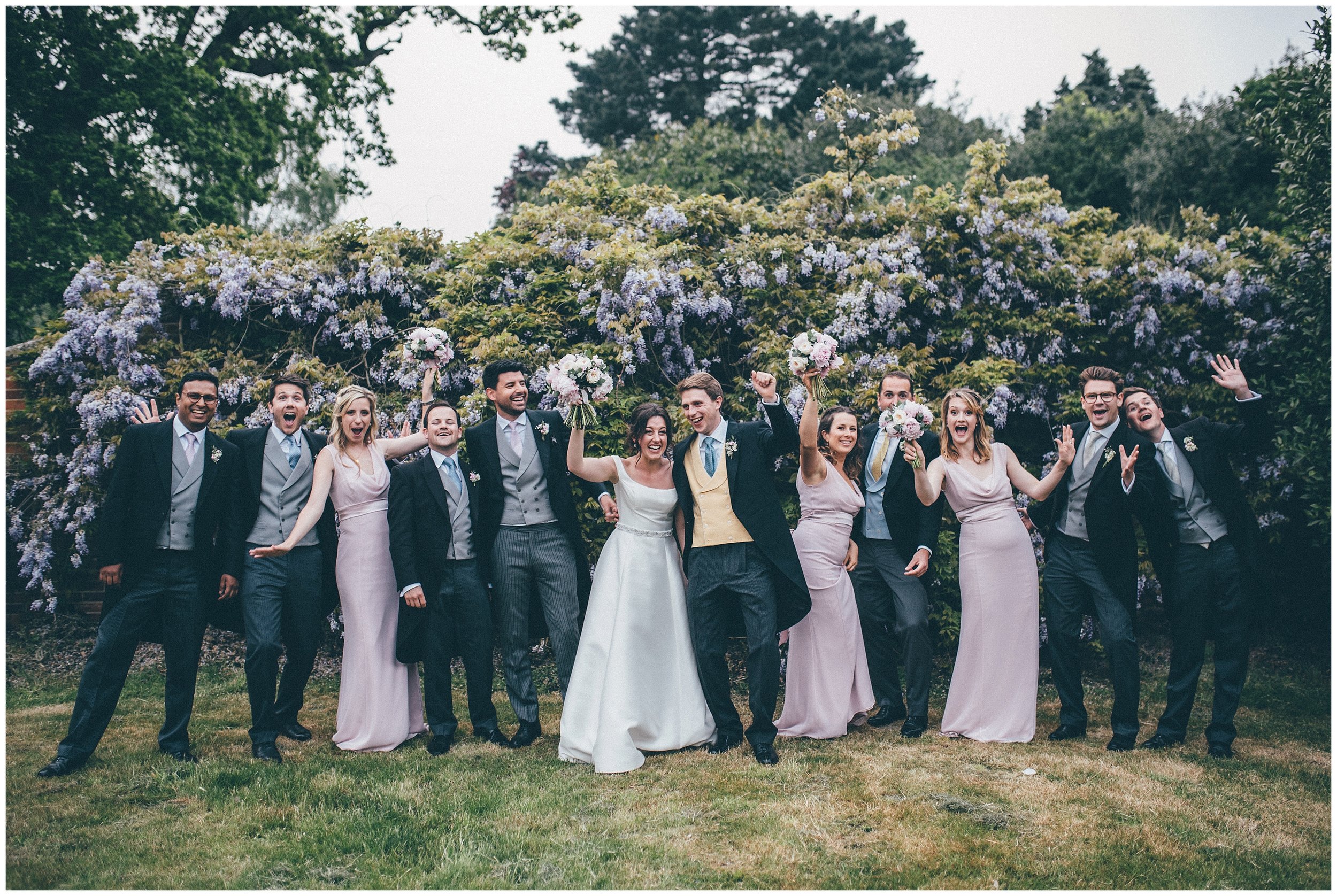 Bride and groom and their bridal party at Henham Park in Southwold.