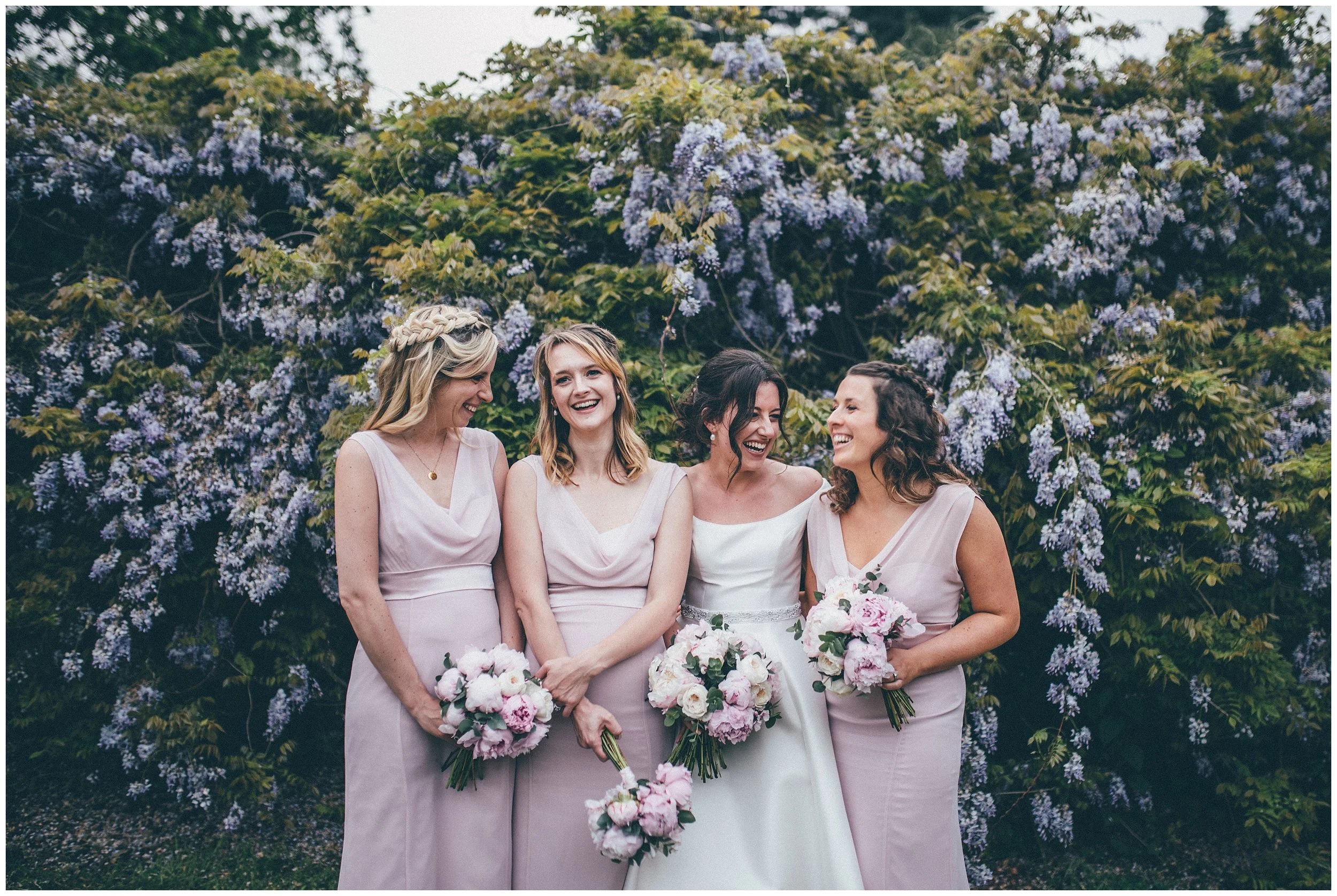 Bride and groom and their bridal party at Henham Park in Southwold.